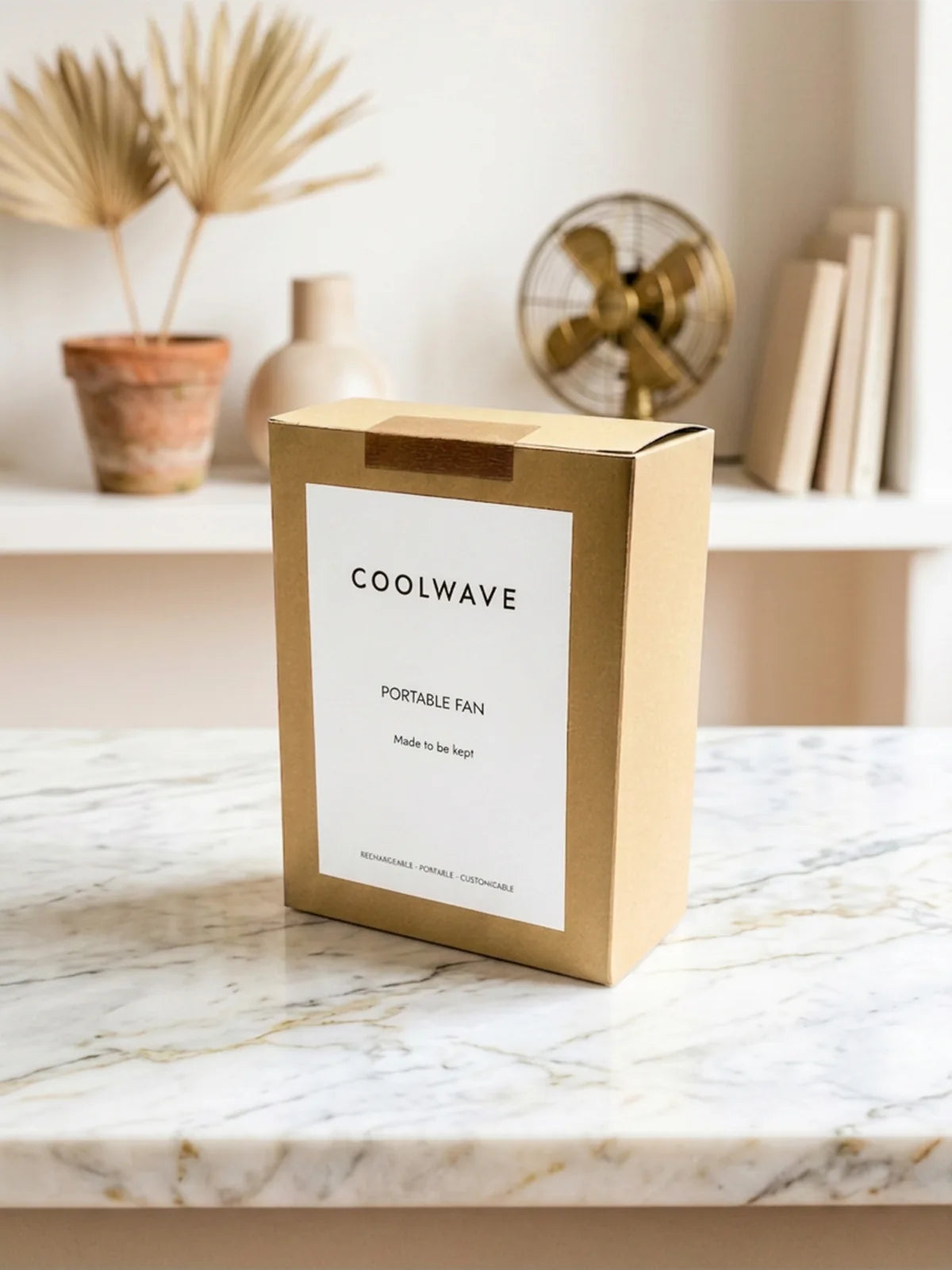 CoolWave handheld fan presented in a custom branded box and sleeve